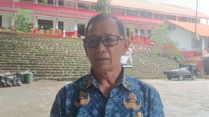 Rahman-Manopa-Kepsek-SMPN-4.-manadosiana.net_.jpeg